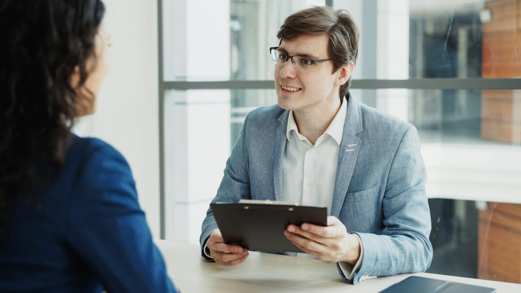 insurance agent with client