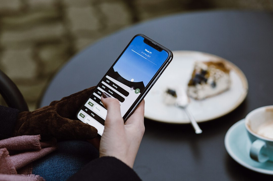person using mobile app for insurance